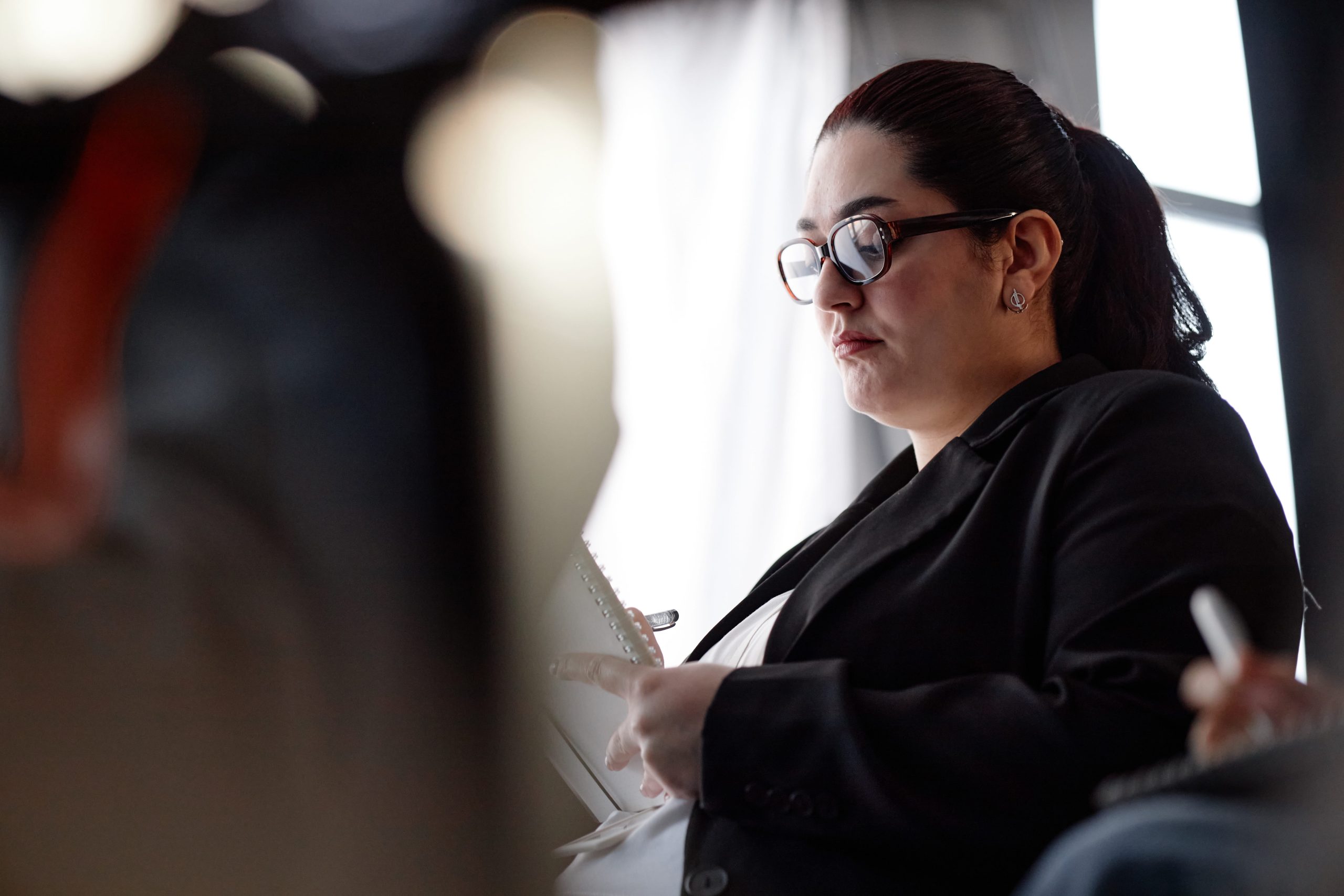 Court reporter taking notes during a legal proceeding in Lakewood Ranch