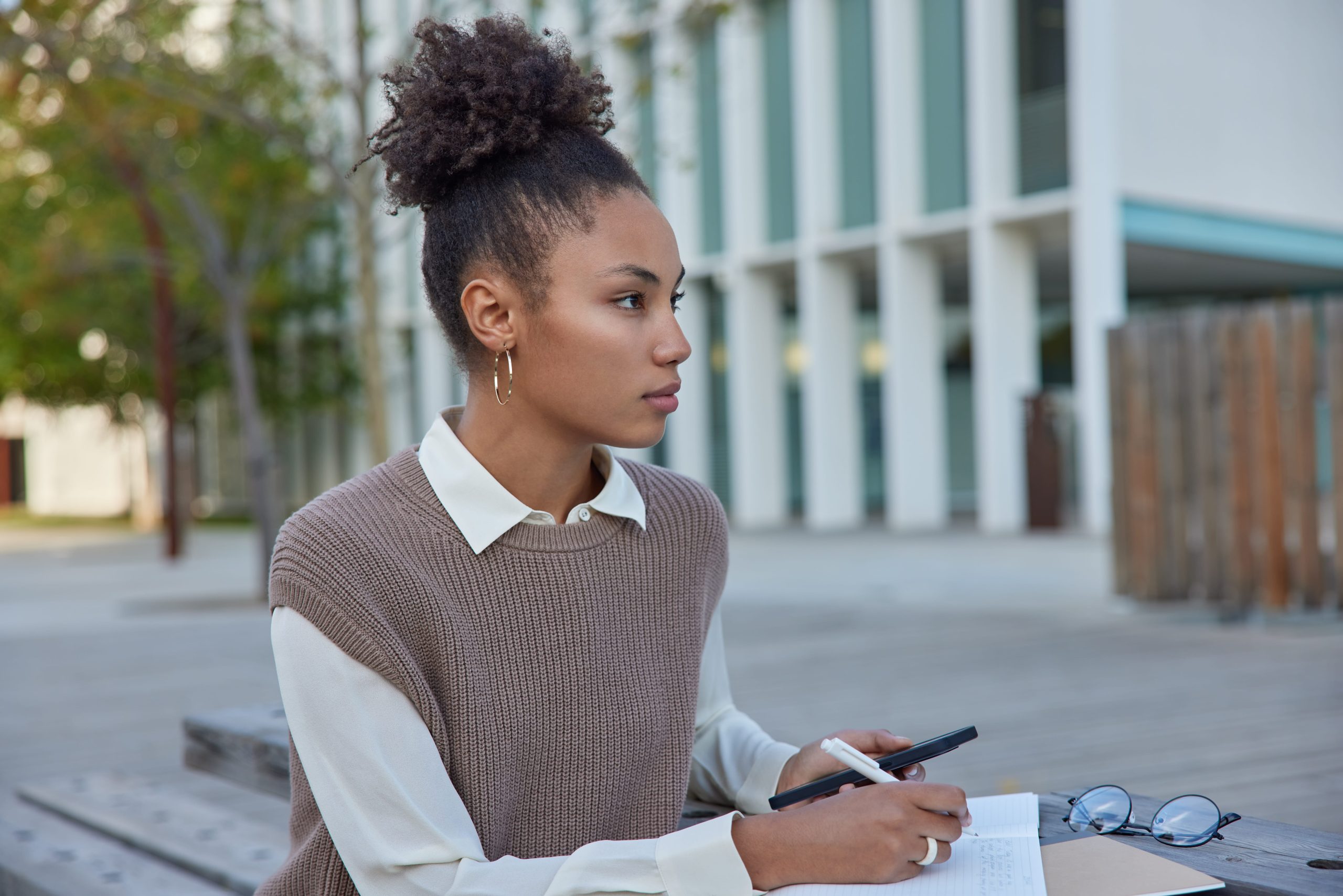 Court reporter or legal professional reviewing notes