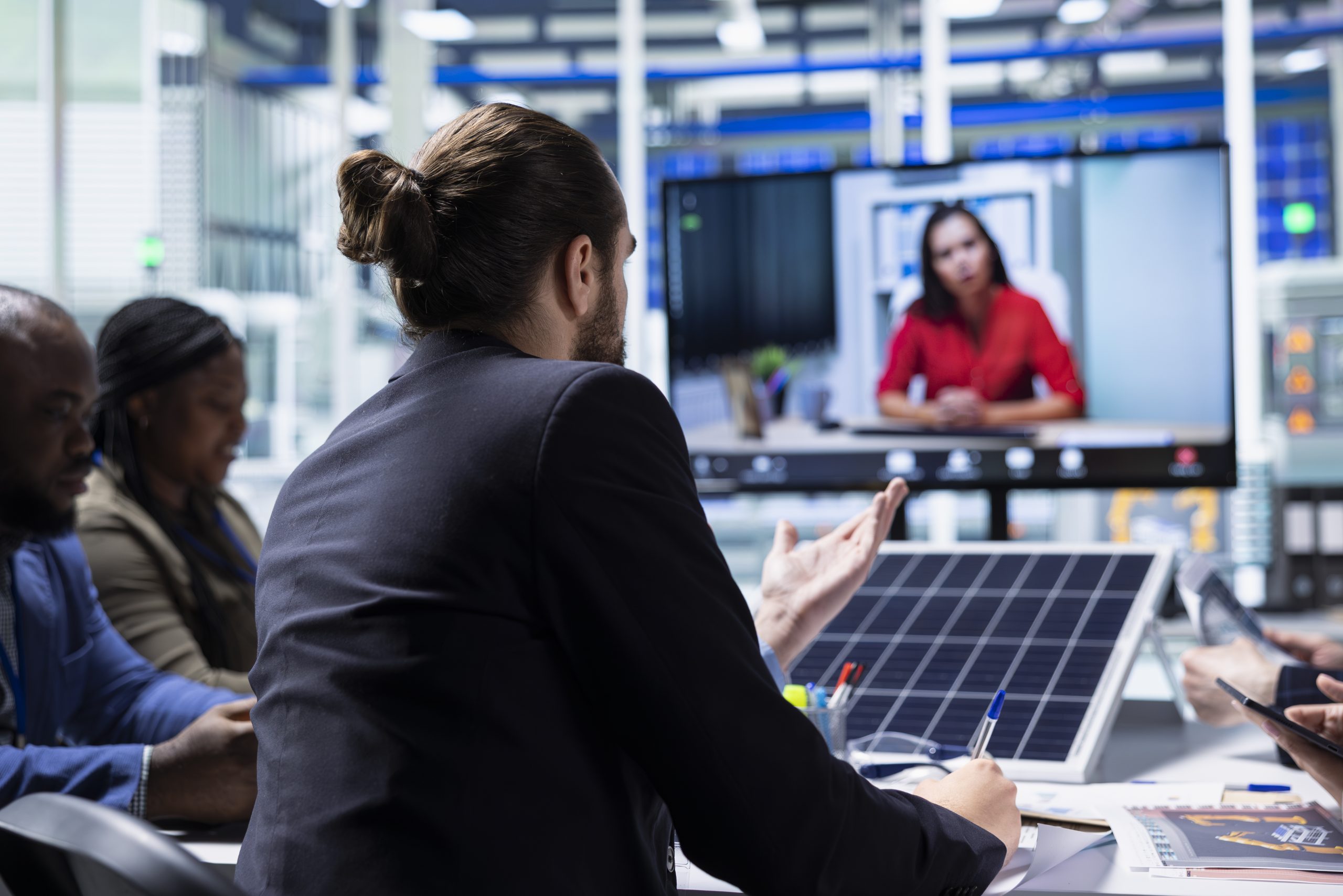 Solar panel factory management doing video call for Virtual Court Reporting
