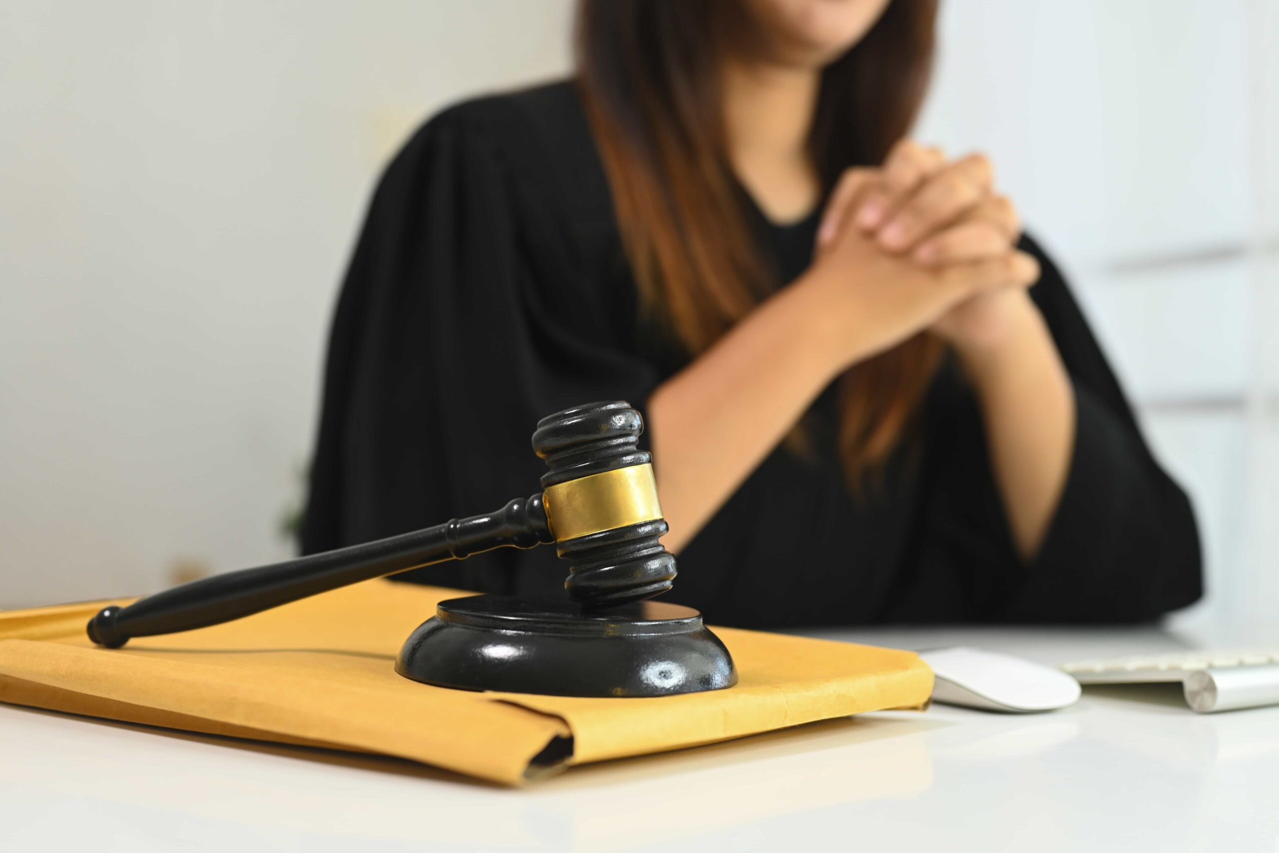 Judge with gavel preparing for court proceedings