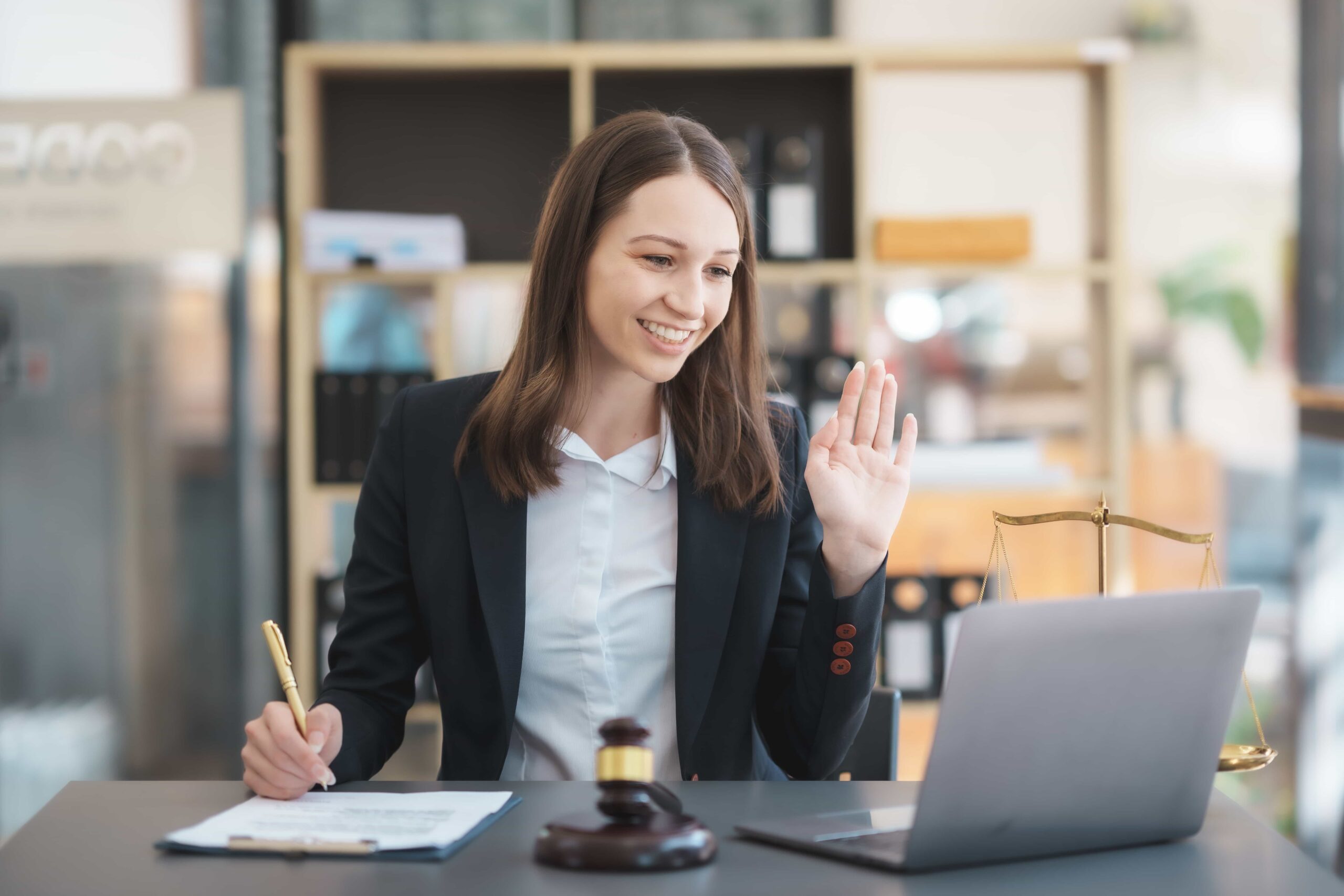 Professional woman attorney on a video call in her office