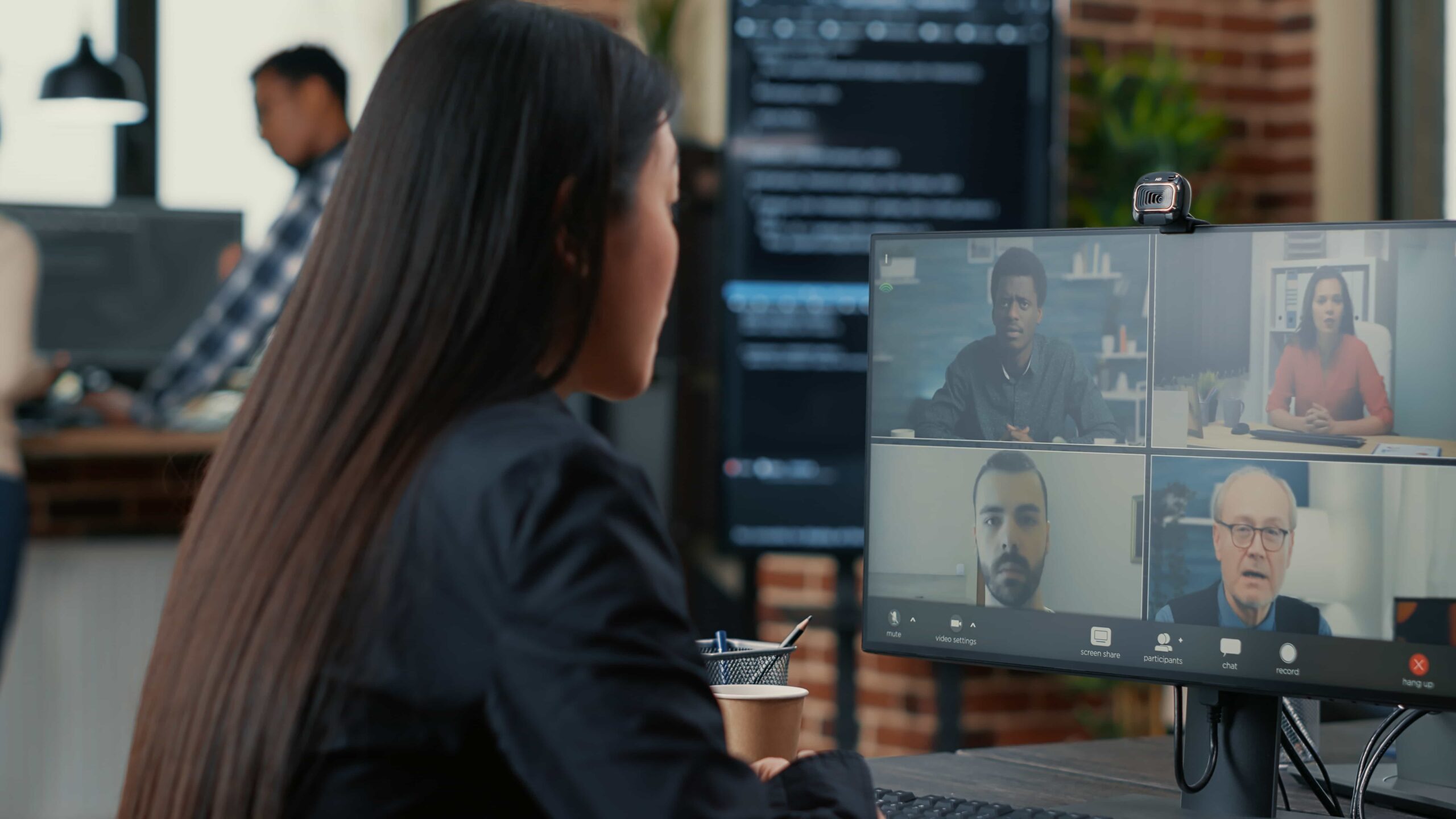 Businesswoman participating in a professional video conference call
