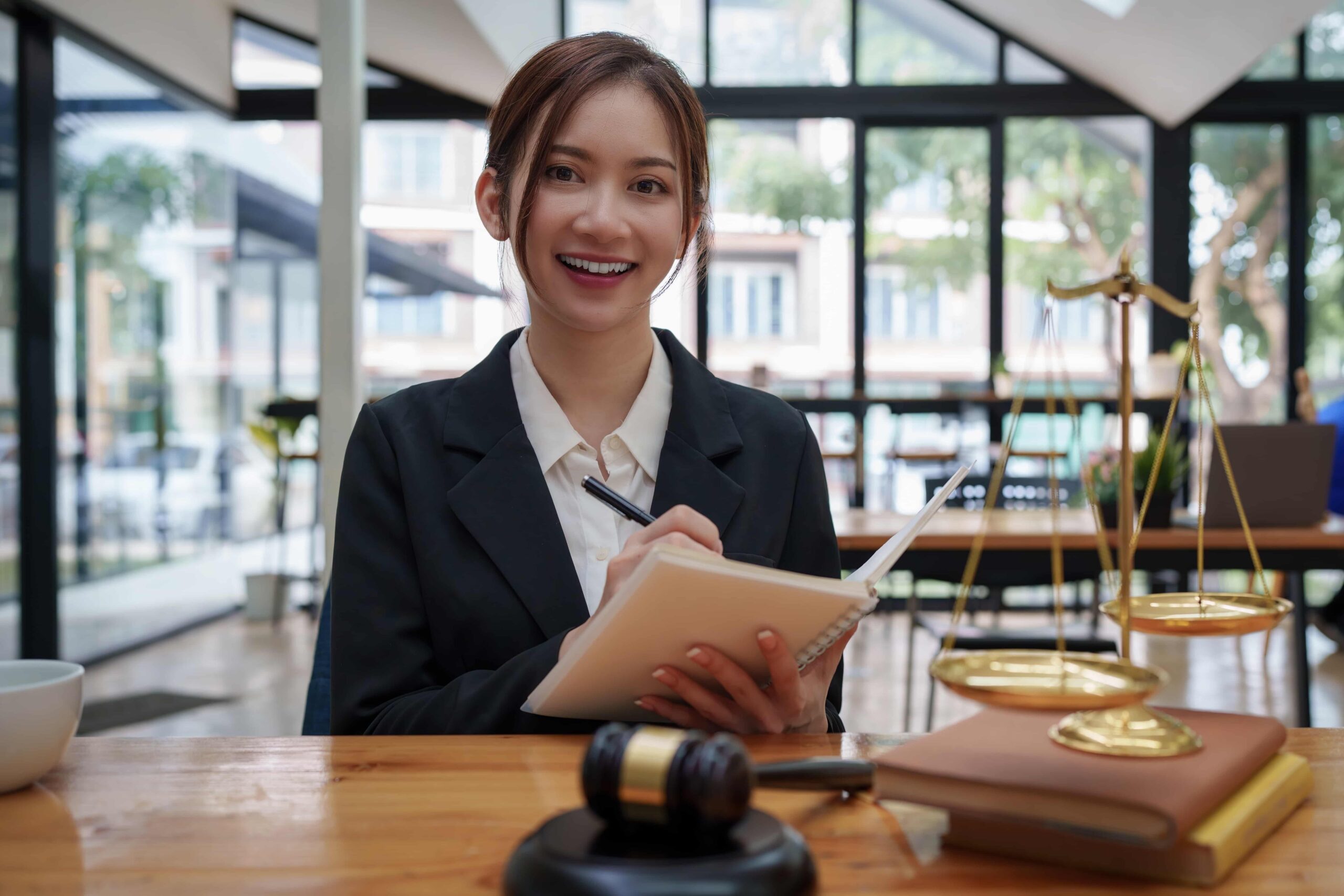 Beautiful businesswoman in a black classic jacket representing St. Petersburg Legal Support